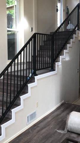 Interior iron stair railing installed by Affordable Fencing